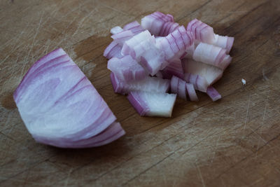 High angle view of chopped bread on cutting board