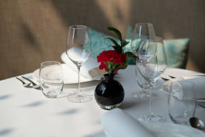 Close-up of wineglasses on table