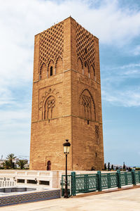 View of tour hassan tower against blue sky - hassan tower or tour hassan  in rabat, morocco