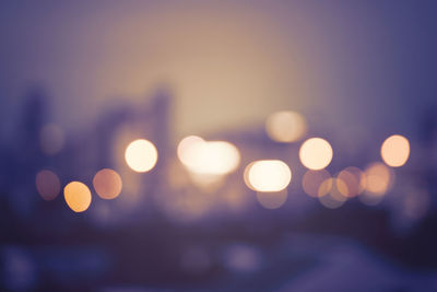 Defocused image of illuminated lights at night