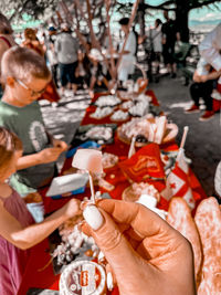 High angle view of woman holding food