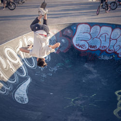 High angle view of people jumping in water