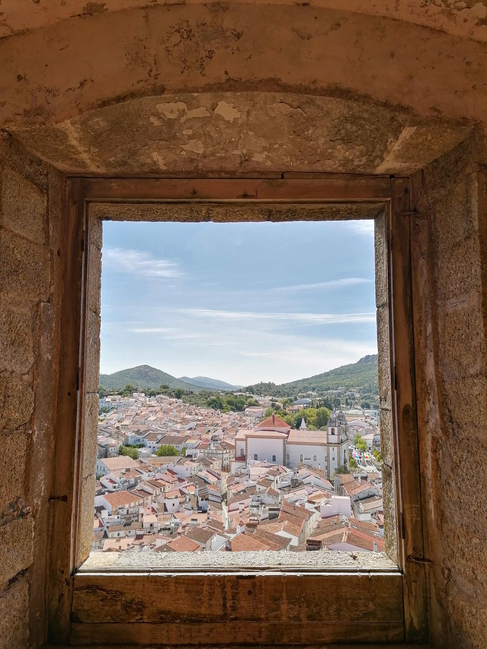 BUILDINGS SEEN THROUGH WINDOW