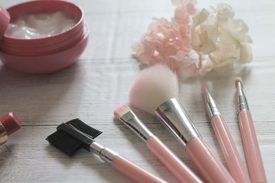 High angle view of pink flower on table