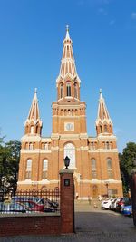 View of clock tower against blue sky