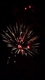 Low angle view of firework display