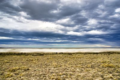 Scenic view of land against sky