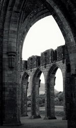 View of old ruin building against clear sky