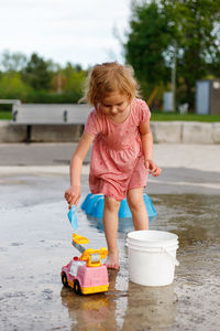 High angle view of boy playing in water