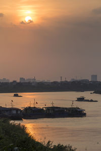 Scenic view of sea against sky during sunset