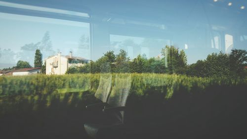 Panoramic shot of agricultural field against sky