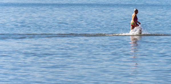 Man surfing in sea