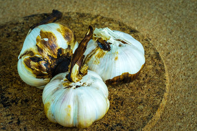 Close-up of rotten garlic bulbs