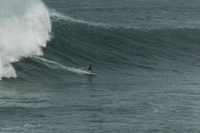 Man surfing in sea