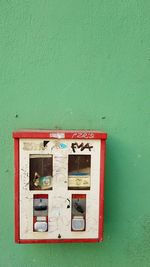 Close-up of mailbox mounted on wall