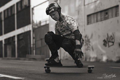 Full length of boy skateboarding on skateboard