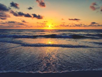 Scenic view of sea against sky during sunset