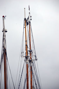 Low angle view of sailboat sailing on sea against sky