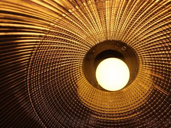 Low angle view of illuminated ceiling