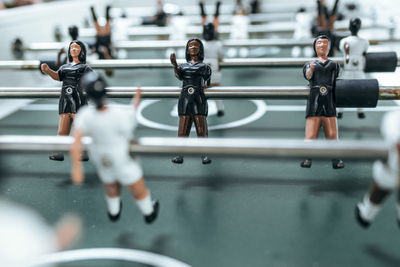 Foosball table with figurine at office