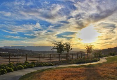 Scenic view of landscape against sky during sunset