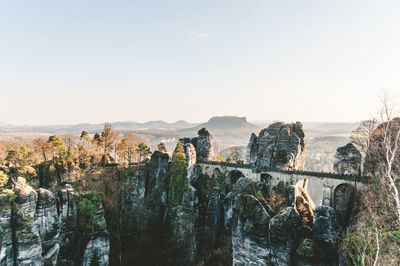 Scenic view of rock formations against clear sky