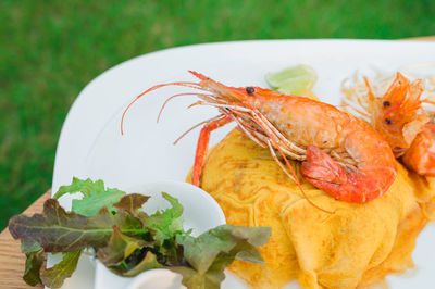 Close-up of fish in plate on table