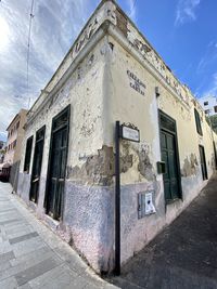 Low angle view of old building against sky