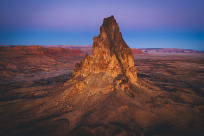 Aerial view of agathla peak in the morning from above, arizona