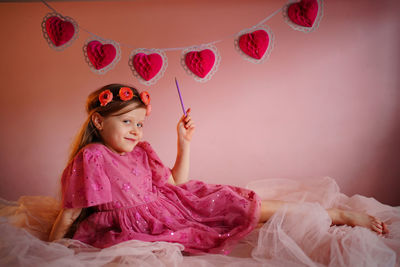 Girl writes a valentine