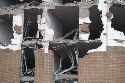 Low angle view of building being demolished, abandoned, wrecked, wrecking ball