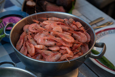 High angle view of seafood in container on table