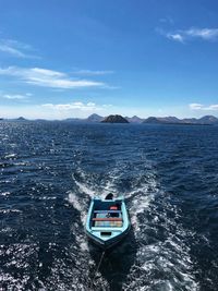 Boat in sea against sky