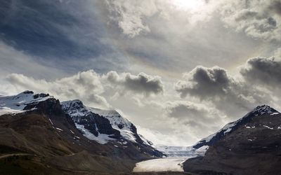 Scenic view of snow covered mountains