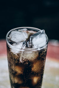 Close-up of ice glass on table