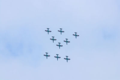 Low angle view of airplane flying in sky