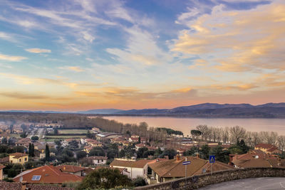 High angle view of townscape against sky at sunset