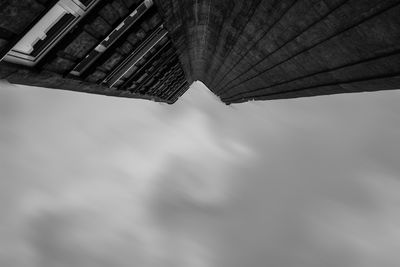 Directly below shot of building against sky