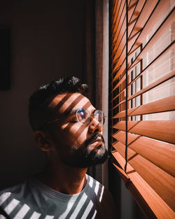 Portrait of young man looking away