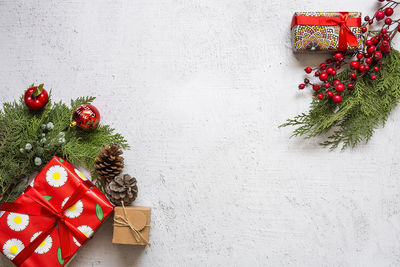 Christmas decoration and presents on table