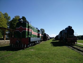 Train on railroad track against sky