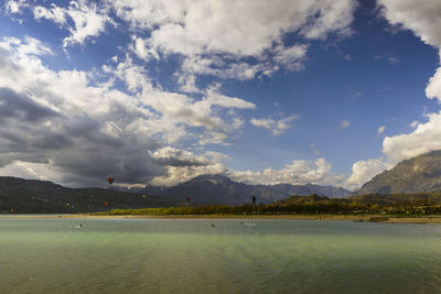 Sea with mountain in background