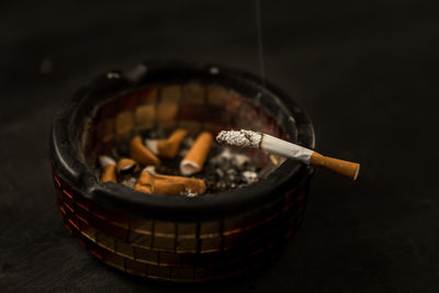 Close-up of cigarette on ashtray