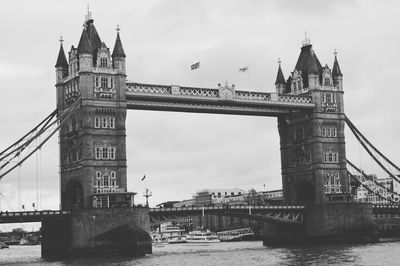 View of tower bridge against cloudy sky