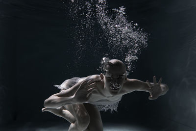 Portrait of woman swimming in sea