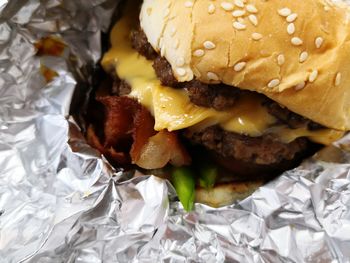 Close-up of burger on paper