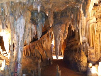 Low angle view of illuminated cave