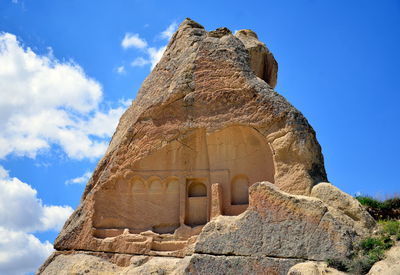 Low angle view of rock formations against clear sky