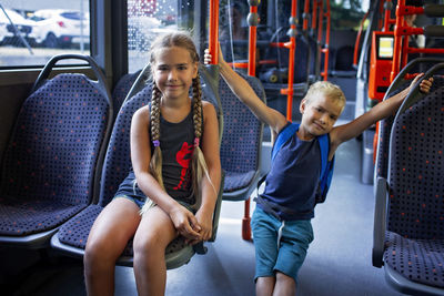 Portrait of woman using mobile phone