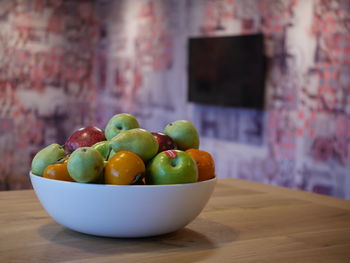 Close-up of fruits in bowl on table